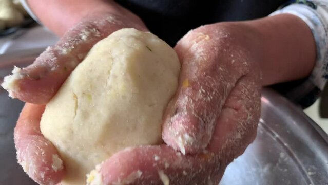 Video of the preparation of "Papa Rellena". traditional Peruvian food made with potatoes. Concept of food.