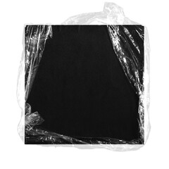 a png crumpled and torn plastic bag wrap on a square black canvas on transparent background,...