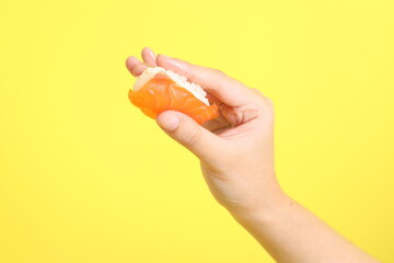 Hand with Sushi