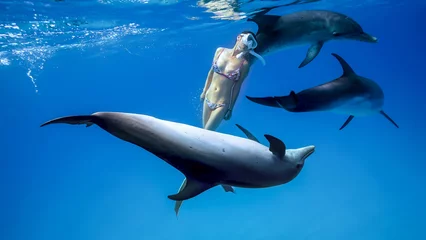 Foto op Plexiglas イルカと泳ぐYuki_写真02_バハマ_2023.6.4 © JUN HASEGAWA