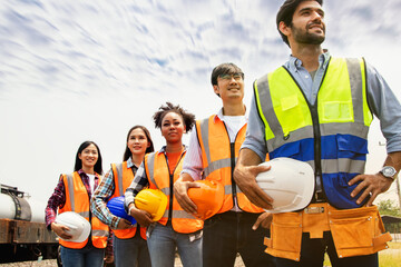 Team diesel railway maintenance depot multiethnic engineers men and women workers various  wearing...