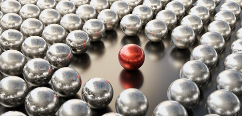 Leadership concept, red leader ball, standing out from the crowd of silver balls. 3D Rendering