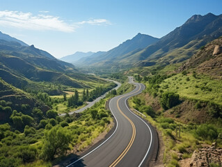 Aerial view of an empty  road through the mountains