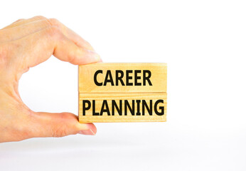 Career planning symbol. Concept words Career planning on beautiful wooden block. Beautiful white table white background. Businessman hand. Business, motivational career planning concept. Copy space.
