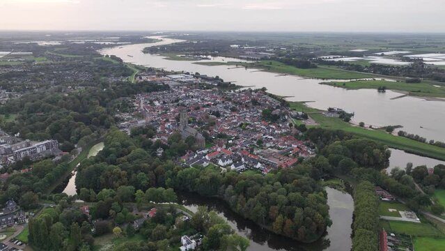Aerial drone view of Zaltbommel, Fortress city, Historic town and dutch cityscape along the river Waal.