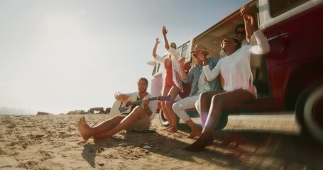 Slow Motion Portrait of Multiethnic Men and Women Having Fun, Enjoying Their Youth and Summer Warm Days. Group of Young Friends Jumping out of a Minivan and Celebrating by Dancing on a Beach