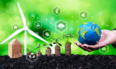 Growing money or coin stack with business investor invest in net zero and sustainable energy...