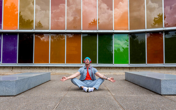 Meditative moment by vibrant facade