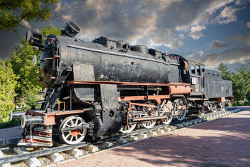 Nostalgic coal-fired steam locomotive exhibited in the garden. Ali Çetinkaya train station, Afyonkarahisar