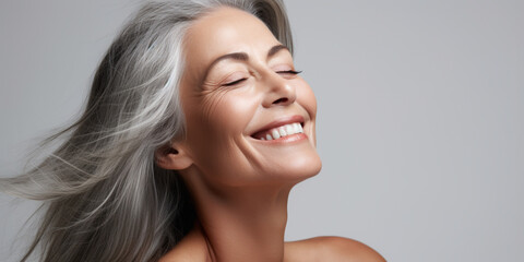 Portrait of Beautiful Older 50s 60s 70s Mid Aged Healthy Mature Woman Isolated on White Background. Anti-aging Skin Care Beauty, Cosmetics Concept. Natural Beauty Product.