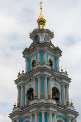 Fototapeta na wymiar Kostroma, Russia, July 8, 2023. Fragment of the bell tower with a dome in the Kremlin.