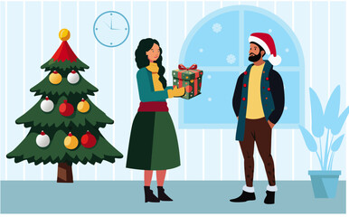 Christmas scene of a young couple exchanging gifts