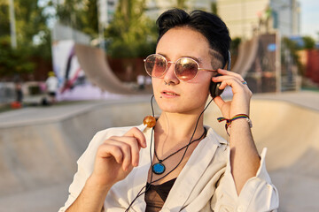 girl with sunglasses and lollipop