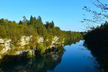 View of Sava river canyon with a reflection in the water in Gorenjska, Slovenia