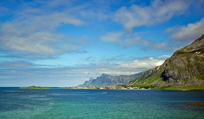 Fototapeta premium Small town at the foot of a mountain range in Lofoten, Norway