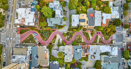 Aerial straight down view Lombard Street with cars driving down red brick road