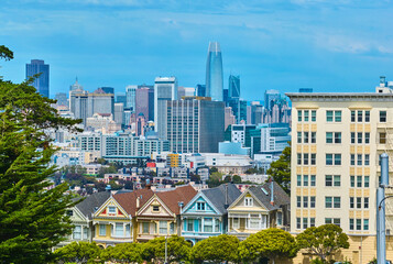 Aerial panorama The Painted Ladies with cloudy blue sky with downtown city skyscrapers