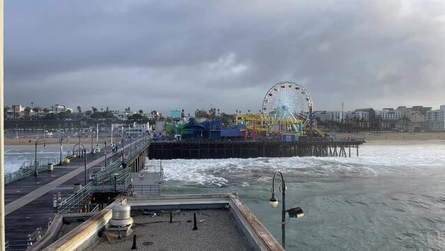 The famous Santa Monica Pier, a few kilometers from Los Angeles in the state of California in the United States of America, with its famous ferris wheel.
