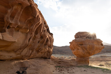 Eroded rock and sunset in the desert near Al-Ula, Saudi Arabia