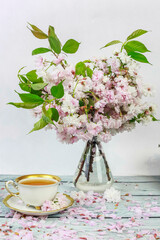 Cup of tea and flowers