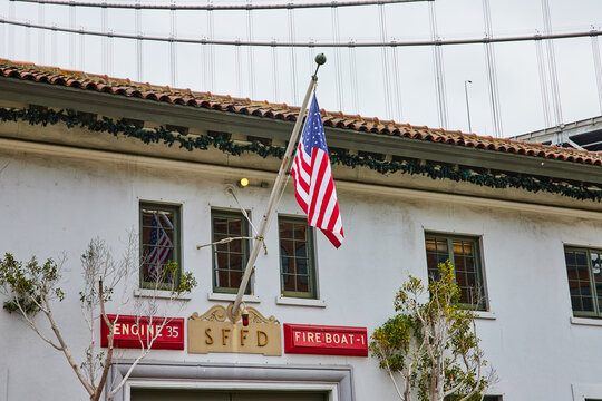 Hanging American Flag outside San Francisco Fire Department upper window view