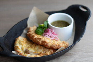 Sous Vide Pork Empanadas in a Cast Iron Skillet