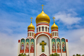 Fototapeta premium Gorgeous blue sky with white misty clouds over Holy Virgin Cathedral in San Francisco