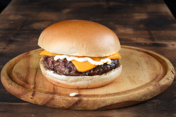 sandwich with beef burger on brioche bread salad egg and bacon street food fast food