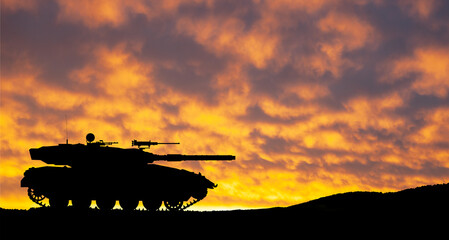 Silhouette of army tank at sunset sky background. Military machinery.