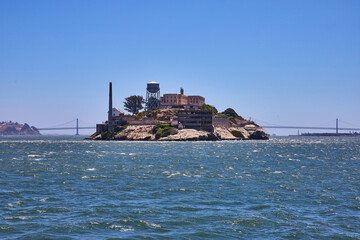 Fototapeta premium San Francisco Bay with Alcatraz Island and Oakland Bay Bridge behind island