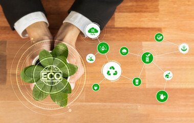 Top view businessman holding plant symbolize environmental protection by corporate ESG commitment...