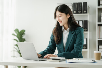 Financial institution worker female asian people, professionals engrossed in tasks. Business people...