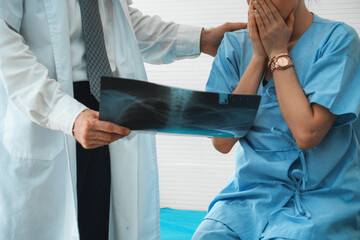 Doctor and unhappy patient at hospital or medical clinic . Healthcare medical malpractice and...
