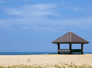 gazebo shelter on  beach on a warm and bright sunny day