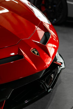 Red Lamborghini Aventador SVJ front end closeup view, Luxury supercar external detail - High Resolution Image