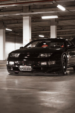 Black Nissan Fairlady Z  front view in empty parking lot - JDM Portrait shot