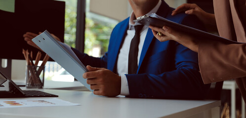 Fototapeta premium Team of business people working together in the meeting room office, teamwork background charts and graphs banner, double exposure successful teamwork,business planning concept.