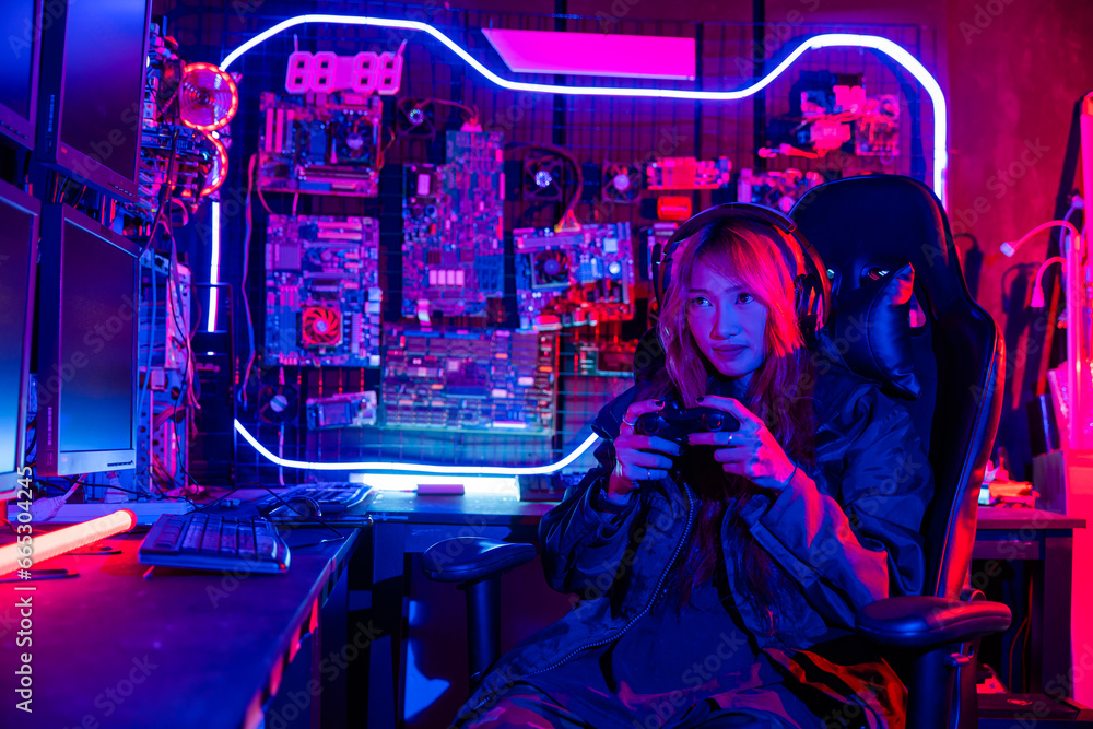 Poster gamer using joystick controller for virtual tournament plays online video game with computer neon li