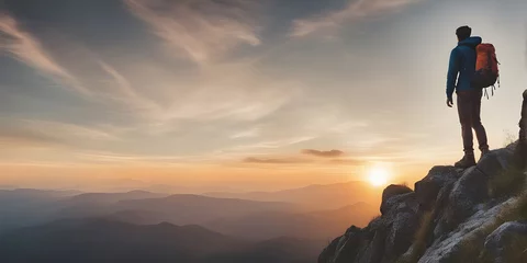 Zelfklevend Fotobehang Young man hiker looking sunset at top of the mountain. goals concept. success concept. © Smile Studio AP