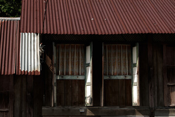 Traditional malay kampung wooden house. Close up