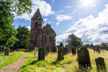 Fototapeta na wymiar a view of St. Mary's Church and grounds, Walton, Cumbria, UK