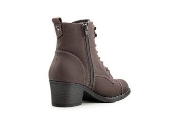 Brown classic women's suede zip-up boots with a low wide heel on a white background. Rear view. Copy space. Layout. Boots