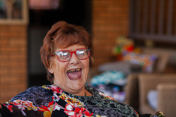Happy laughing senior woman portrait