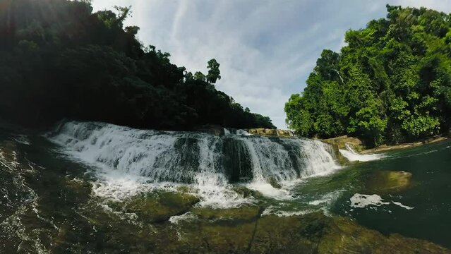 Sunlight over the waterfalls. Tinuy-an Falls. Bislig, Surigao del Sur. Philippines.