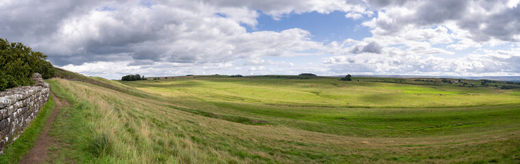Fototapeta na wymiar panoramic view on Hadrian's Wall Path near Once Brewed, Northumberland, UK