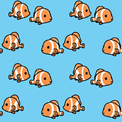Naklejka premium Seamless pattern with clownfish on blue background. Vector illustration.