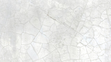 Image of cracked cement floors inside a building.