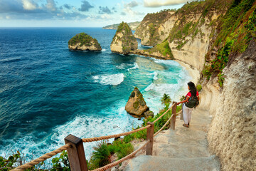 Travel people enjoy epic view nature landscape tropical beach Bali with scenery mountain rocks in...