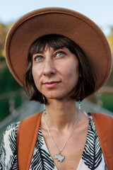 portrait of a young girl in a hat.