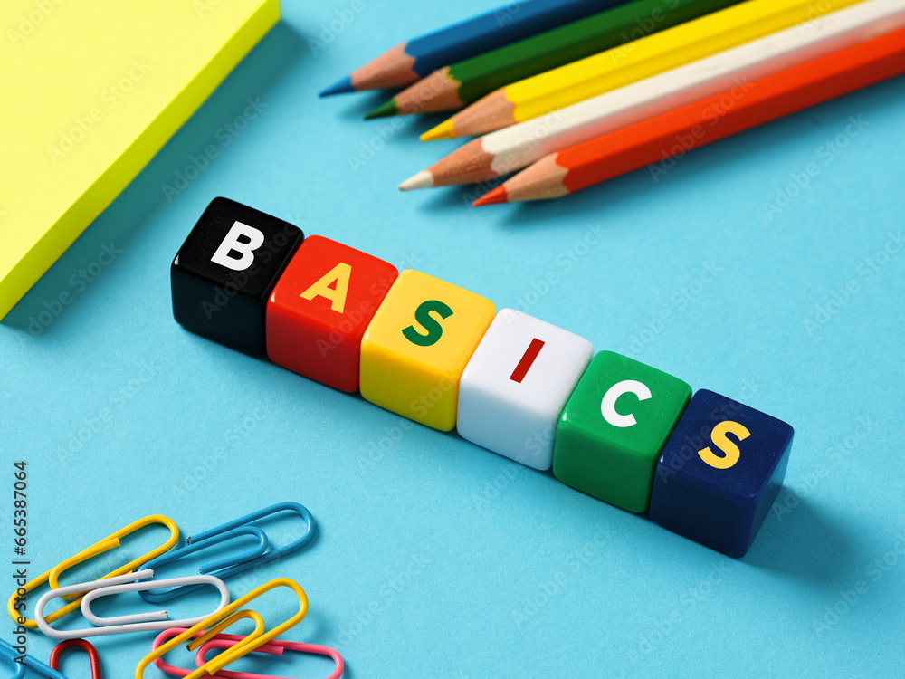 Poster teaching and learning the basics in education concept. basic knowledge. the word basics on colorful 